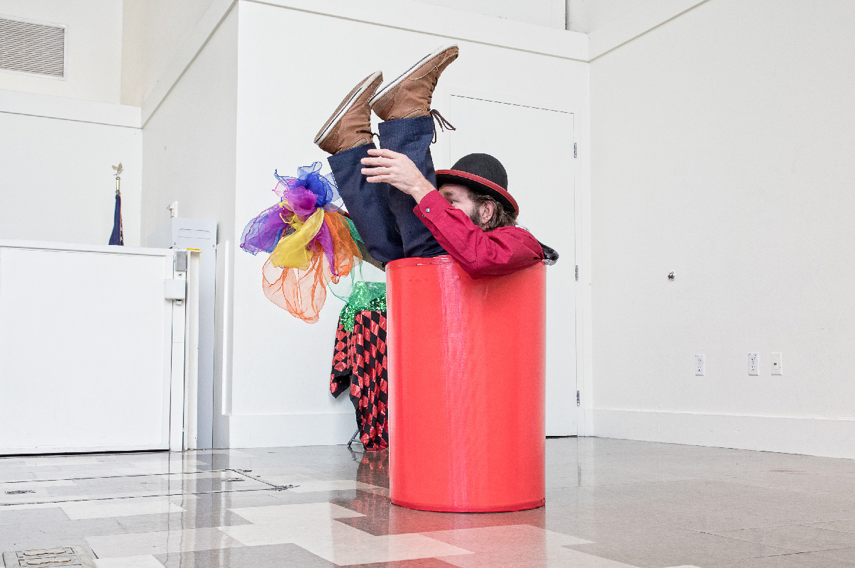 Slim inside of a barrel with colorful scarves